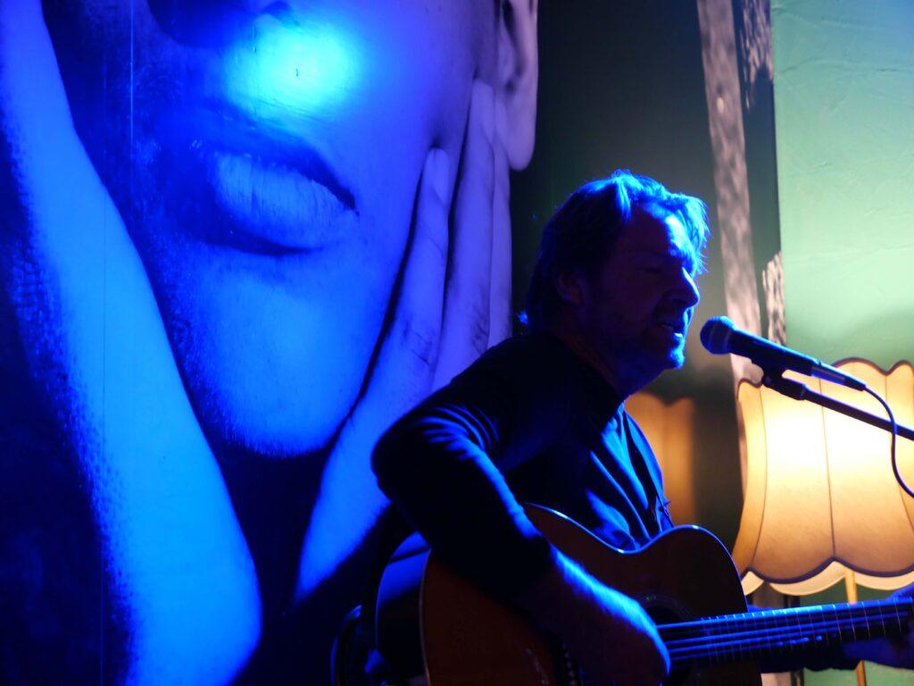 Jake Jackson singing his songs at a gig in Melbourne